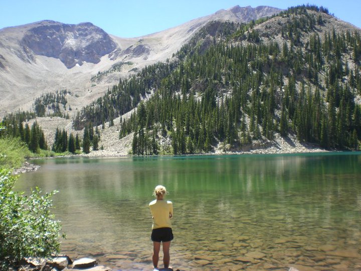 Ashley Arnold stands before Thomas Lake admiring Mt. Sopris looming above.