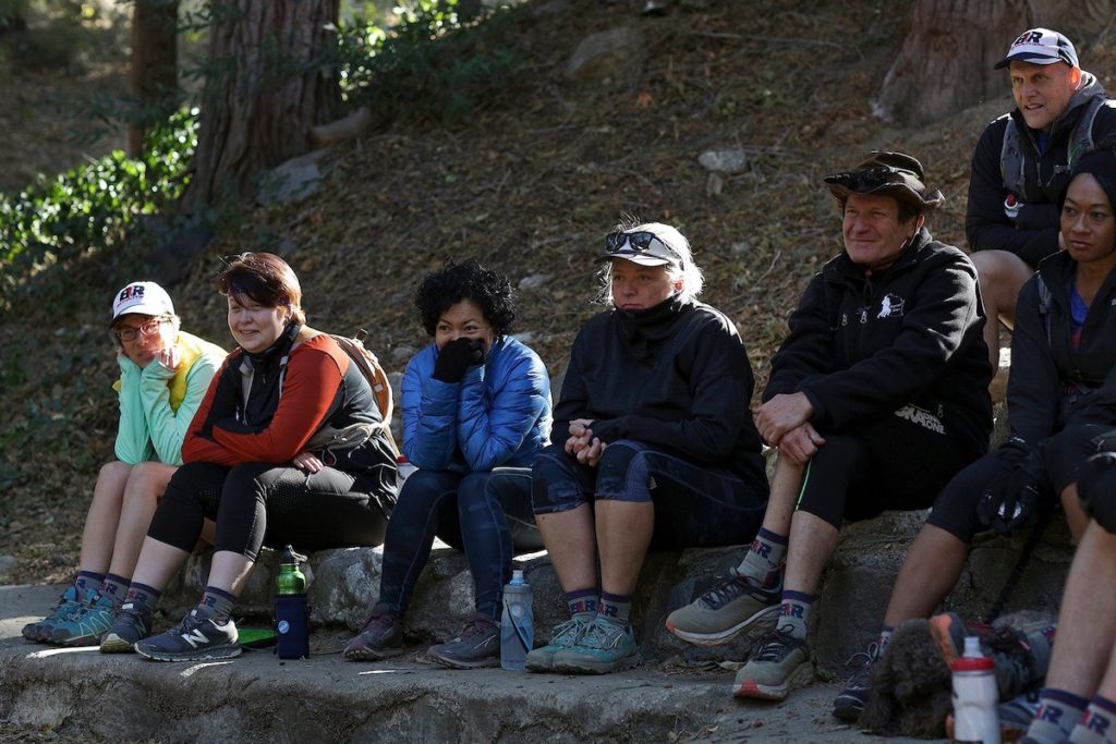 Zavala (blue jacket) has always found personal peace through the physical act of running, but it was the trail running community that allowed her to begin to open up emotionally. PC: Lisa Krantz