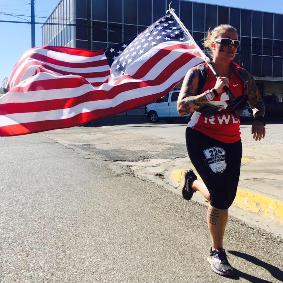 Jessica Cunningham carries Old Glory during the 2015 Texas Independence Relay. PC: Kennon Perez